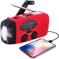 Red hand-crank emergency radio with flashlight and phone charging output
